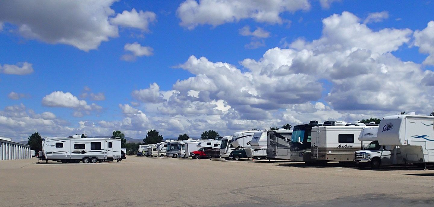 Numerous RVs in a paved parking lot | Idaho Storage Connection