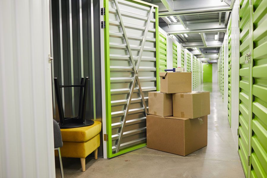 A picture of boxes and furniture in a storage facility | Idaho Storage Connection